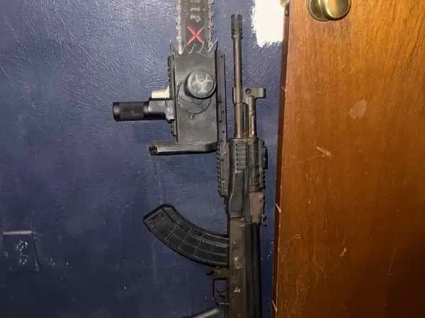 AK WITH CHAINSAW