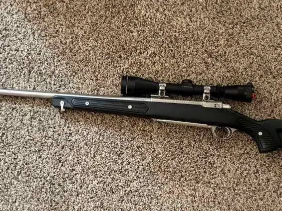 Ruger M77 7MM Rem Mag w/ zytel stock & leupold