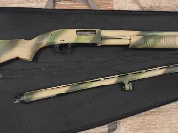Maverick 88 spray painted w/ 2 barrels