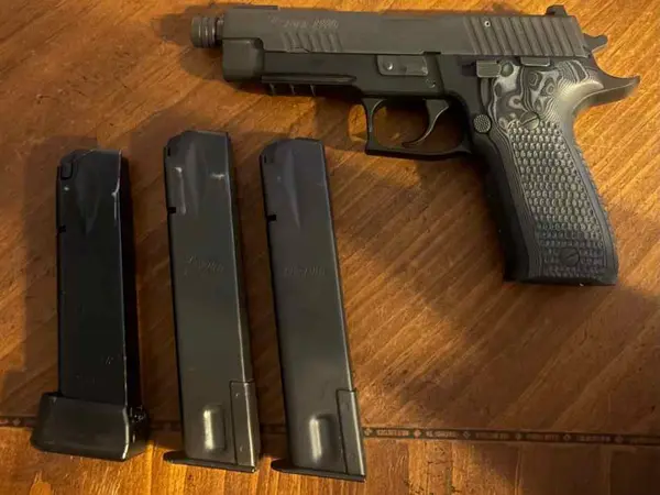 Sig Sauer p226 threaded 9mm with 3 20rd mags