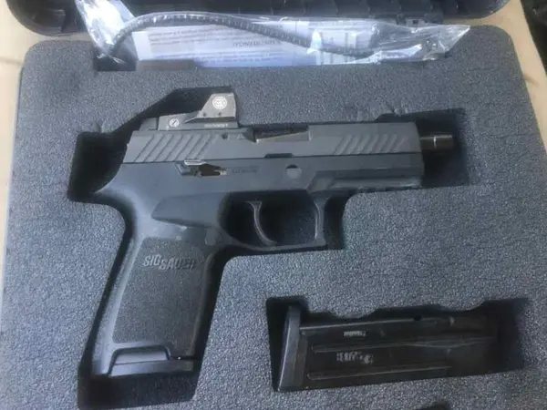 Sig 320 RX compact w/ silencerco barrel & holster