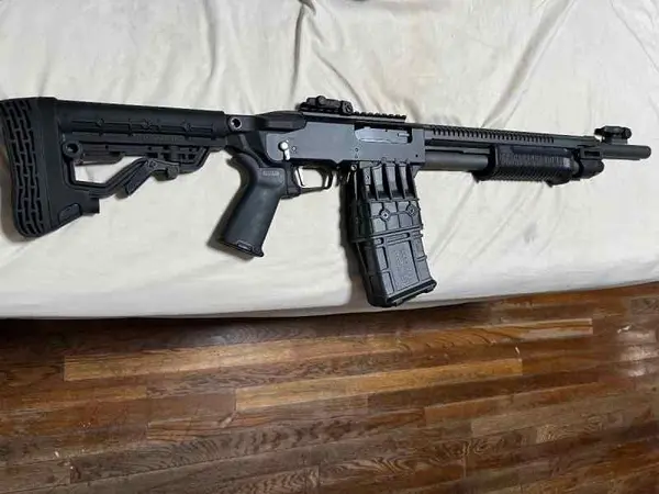 Mossberg 590 RM ( new ) never shot 10+1 mag fed