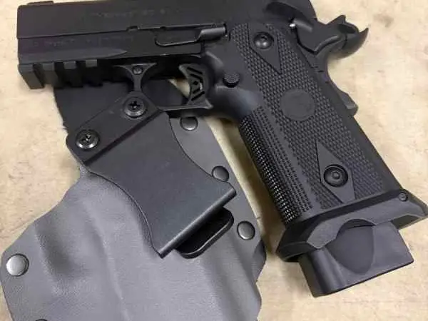 Witness 2311 ready for sight with custom holster