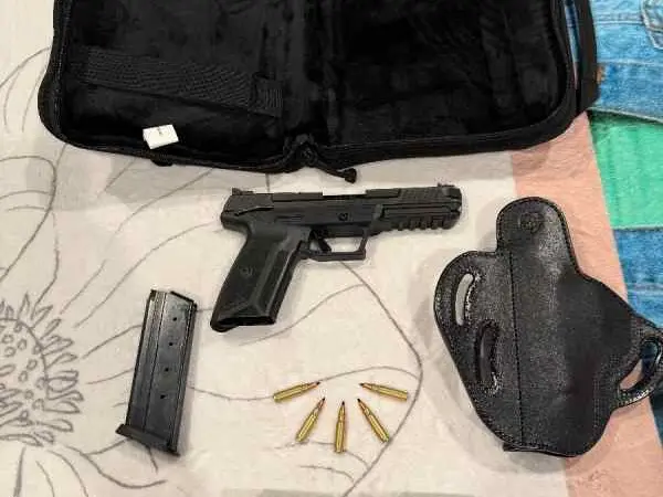 Dropped price $ Ruger 5.7 , holster and ammo