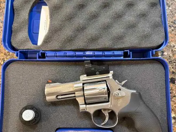 S&W 686 plus 3”, red dot sights