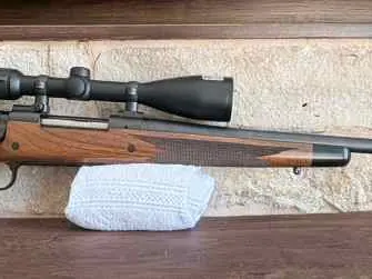 NIB 300 win mag + Swarovski