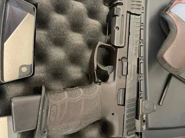 Hk vp9 with comp and trijicon. Read description