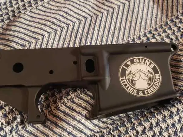 New stripped lower engraved with picture.