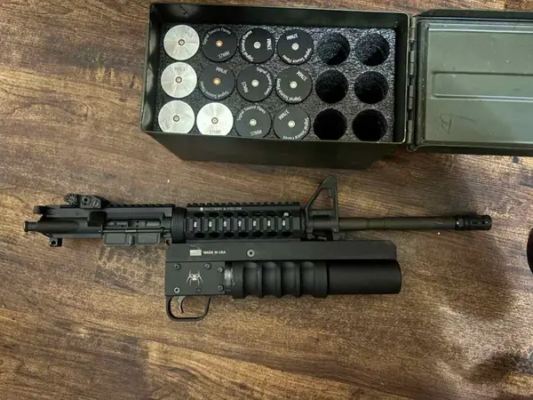 S&w upper / spikes tactical 37mm launcher