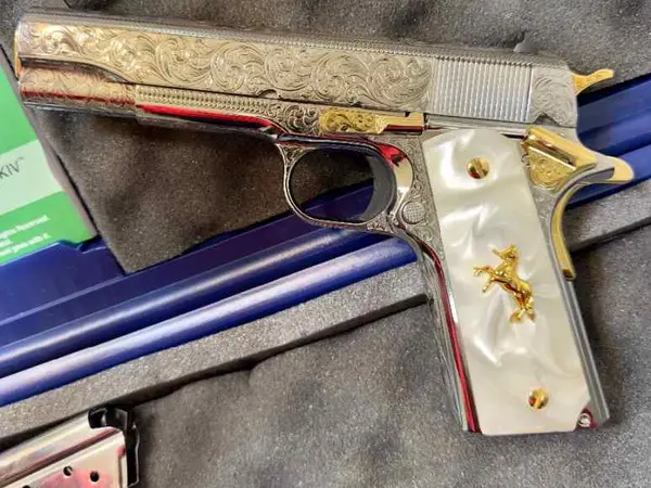 Colt 38 Super engraved asking $2,800