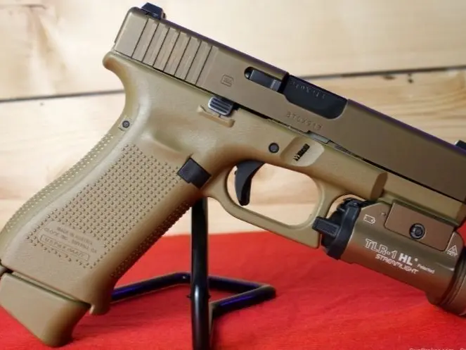 This is a Glock 19X 9MM in Used Excellent Condition It features; 4.02" Barrel 3- 17 Round Magazines Glock MH3 Night Sights Rear 2 Dot Sight Front Dot Sight StreamLight TLR-1 HL DARA OWB Holster  - photo 2