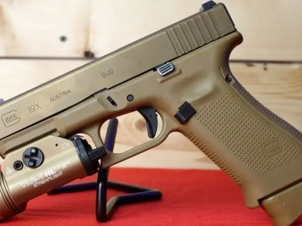 This is a Glock 19X 9MM in Used Excellent Condition It features; 4.02" Barrel 3- 17 Round Magazines Glock MH3 Night Sights Rear 2 Dot Sight Front Dot Sight StreamLight TLR-1 HL DARA OWB Holster  - photo 3