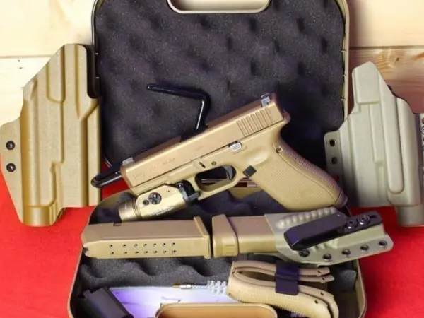 This is a Glock 19X 9MM in Used Excellent Condition It features; 4.02" Barrel 3- 17 Round Magazines Glock MH3 Night Sights Rear 2 Dot Sight Front Dot Sight StreamLight TLR-1 HL DARA OWB Holster 